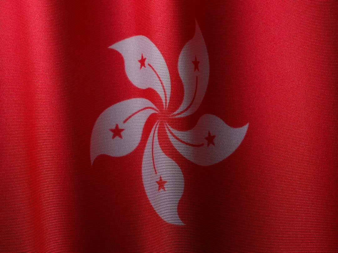 a close up of a red and white flag