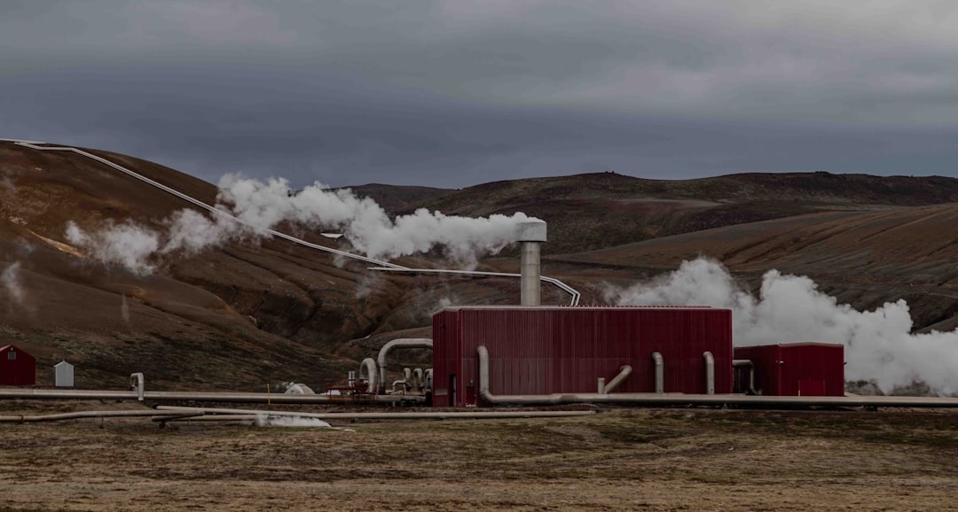 a red building with steam coming out of it