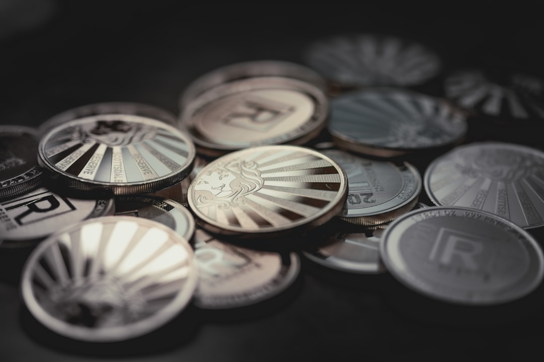 a pile of coins sitting on top of a table