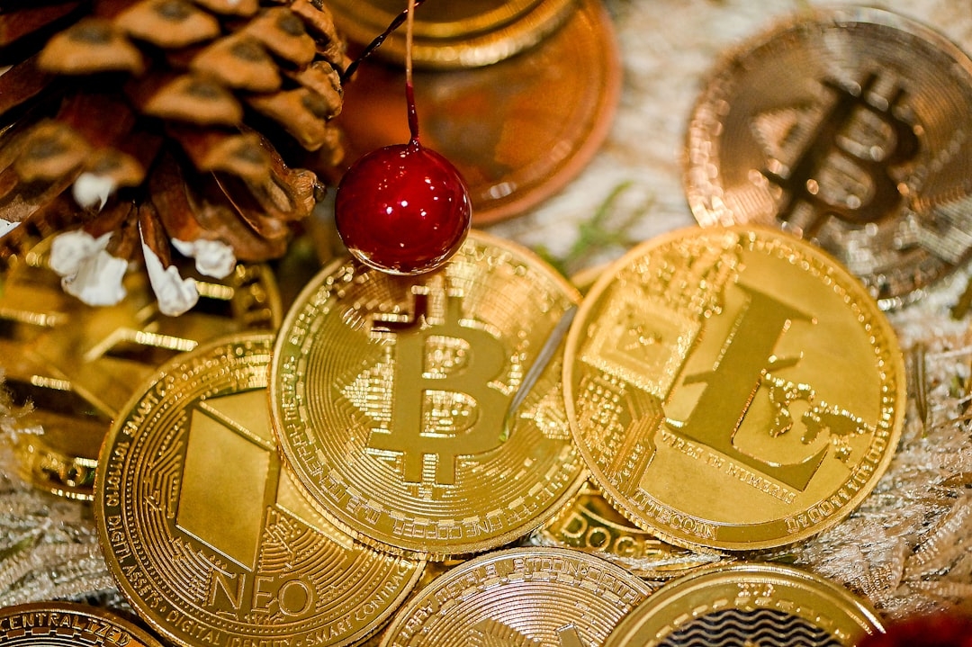 a pile of gold bitcoins sitting on top of a table